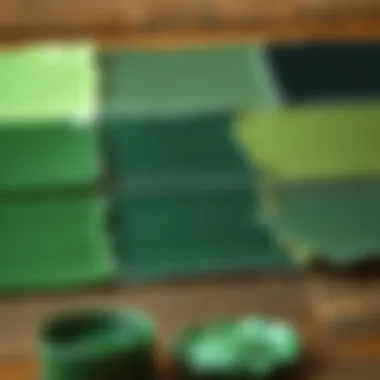 An artistic representation of different shades of green paint swatches