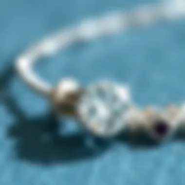 Close-up of polished silver jewelry reflecting light beautifully