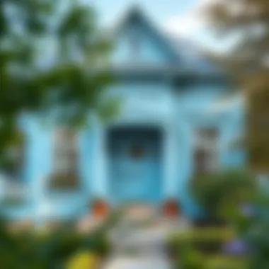 An elegant exterior of a house adorned with light blue paint, blending with nature