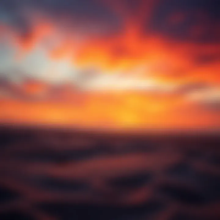 A serene beach at sunset showcasing vibrant colors over the horizon